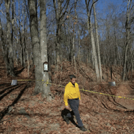 Berlin Fire Chief Jonn Massirio walks past closed trails at Giuffrida Park in Meriden, Conn., Wednesday, November 6, 2024. Giuffrida Park reopens Thursday with access to trails around the Bradley Hubbard Reservoir and Chauncey Peak. Trails leading to Lamentation Mountain from Giuffrida Park were closed during the height of brush fires in Meriden and Wallingford.  Dave Zajac/Hearst Connecticut Media