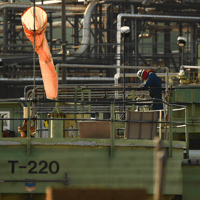 A worker at Chevron’s oil refinery on Jan. 26, 2022 in El Segundo, Calif. Credit: Patrick T. Fallon/AFP via Getty Images