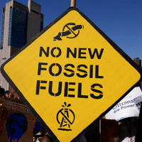 Sign that reads No New Fossil Fuels.